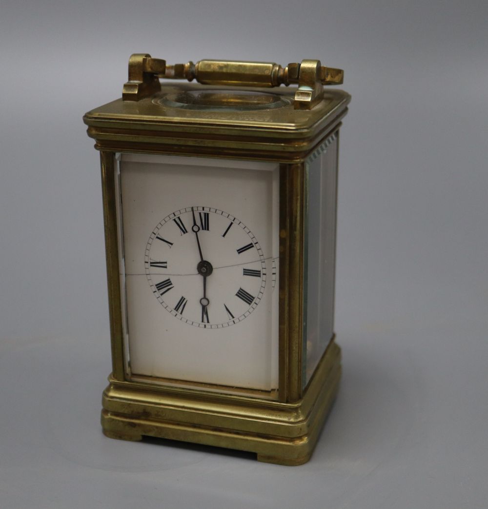 A late 19th century brass carriage timepiece, engraving to the top plate